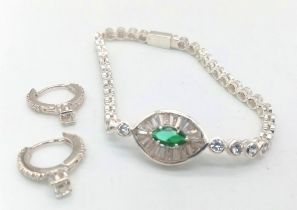 A 925 Silver with Zircons Tennis Bracelet and Hoop Earring Set.