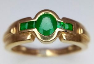 An Art Deco Style 9K Yellow Gold Emerald Ring. Size N. 2.72g total weight.