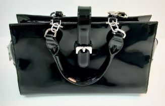 An L.K. Bennett Black Patent Leather Twin Handle Zip Bag. Complete with Dust Cover. 34x12x21cm.