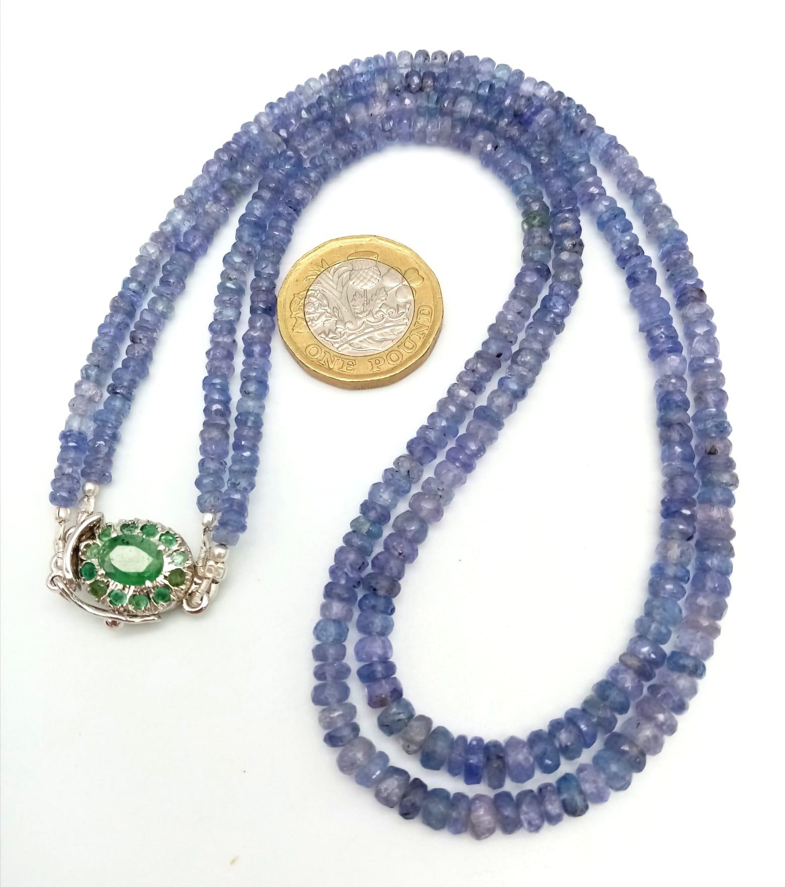 A Two Row Tanzanite Gemstone Necklace with an Emerald and 925 Silver Clasp. 45cm in length, 175ctw - Image 5 of 6