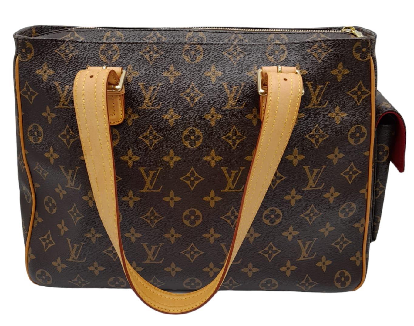 A Louis Vuitton Monogram Multiple Cite Bag. Leather exterior with gold hardware and top zip. Two - Image 3 of 10