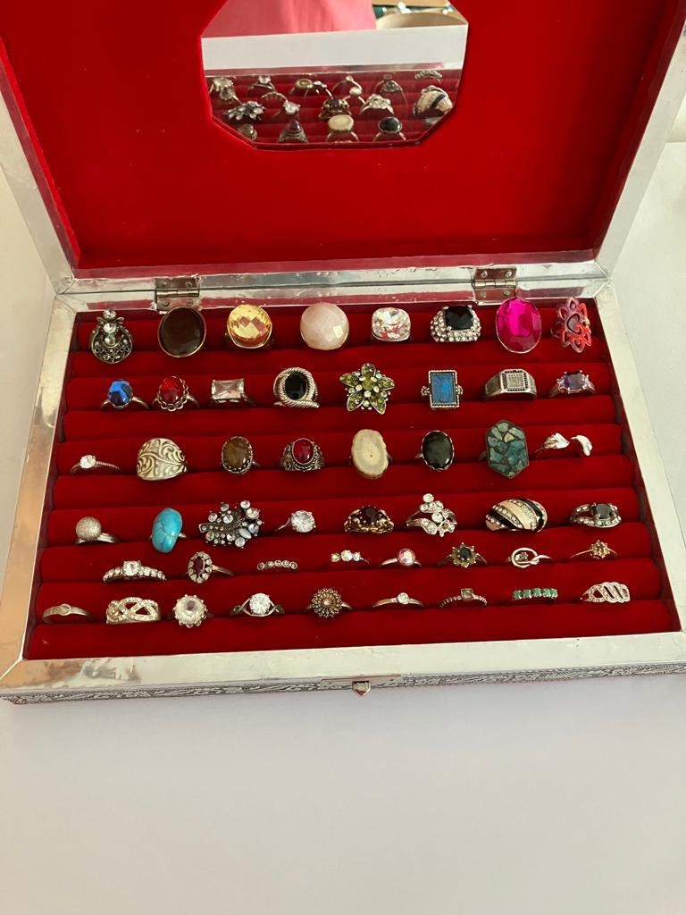 Large selection of DRESS RINGS presented in a Magnificent White Metal Jewellery Box with Beautiful