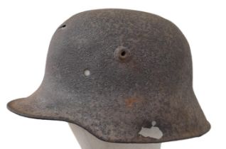 WW1 Battle Damaged German M16 Stahlhelm Helmet. This helmet was found in woodland in the Ypres