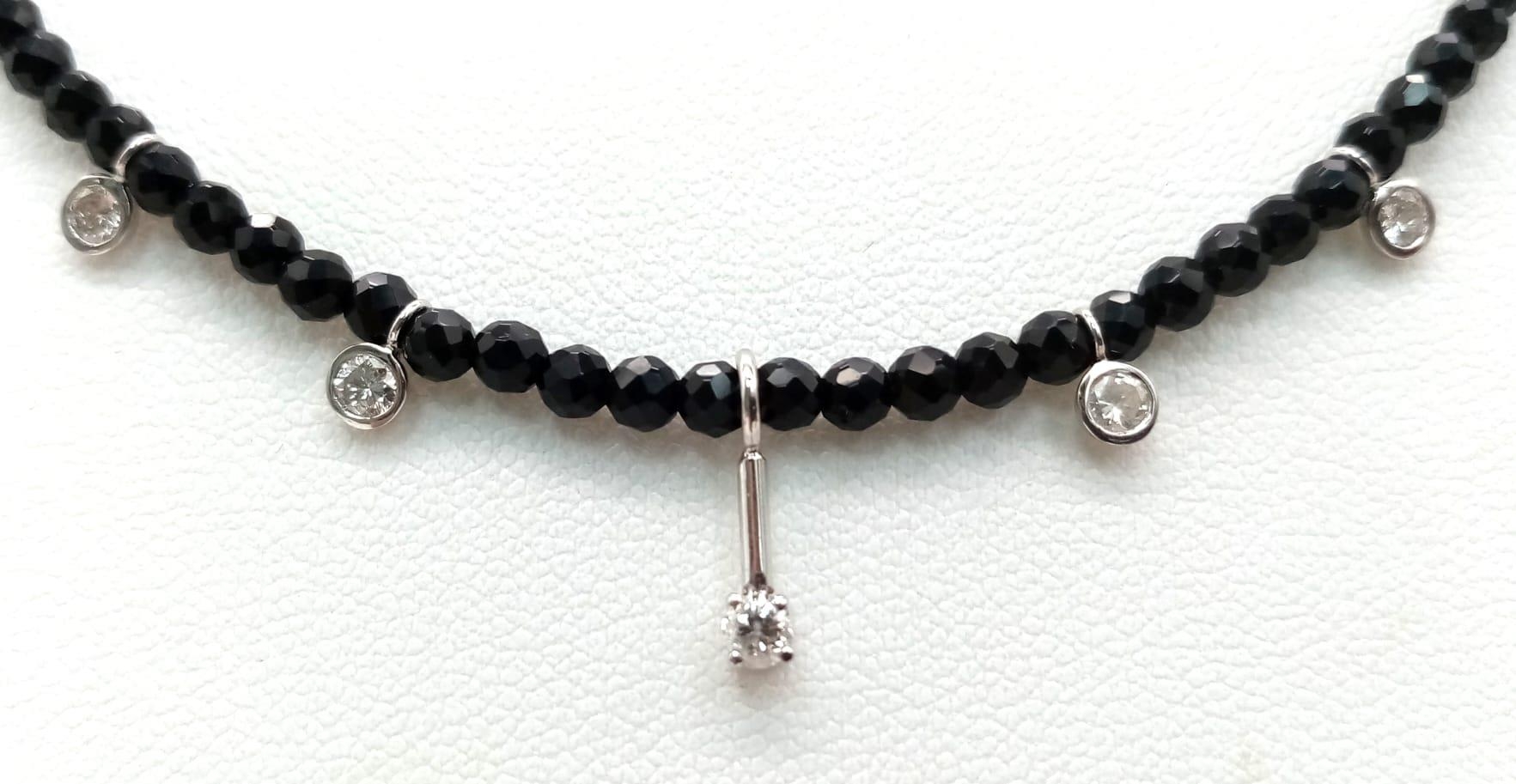A Black Spinel Small Bead Necklace with Five Stone White Diamond Decoration. 0.5ctw. 14k gold clasp. - Image 3 of 5