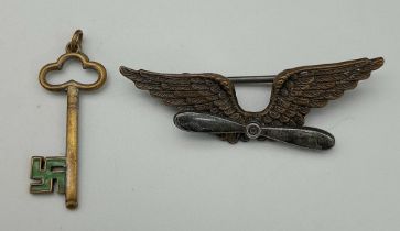 Parcel of two items which date WW2 or prior. 1) Early Period Propeller Bar Brooch. 2) A German