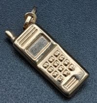 A 9K Yellow Gold Mobile Phone Charm. 0.8g total weight.