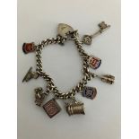 Vintage SILVER CHARM BRACELET Complete with safety chain. Charms to include Tankard, 10 shilling