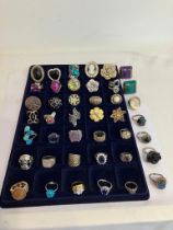Large selection of DRESS RINGS to include Gold Tone, Silver Tone, jewelled,etc.Many statement