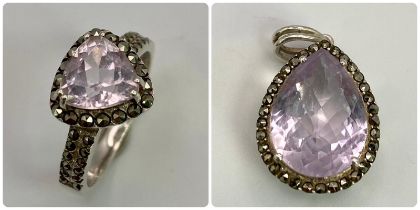 White Metal Ring and Pendant pairing with matching Pink Gemstones. Ring Size: O Pendant Size: 2.5cm