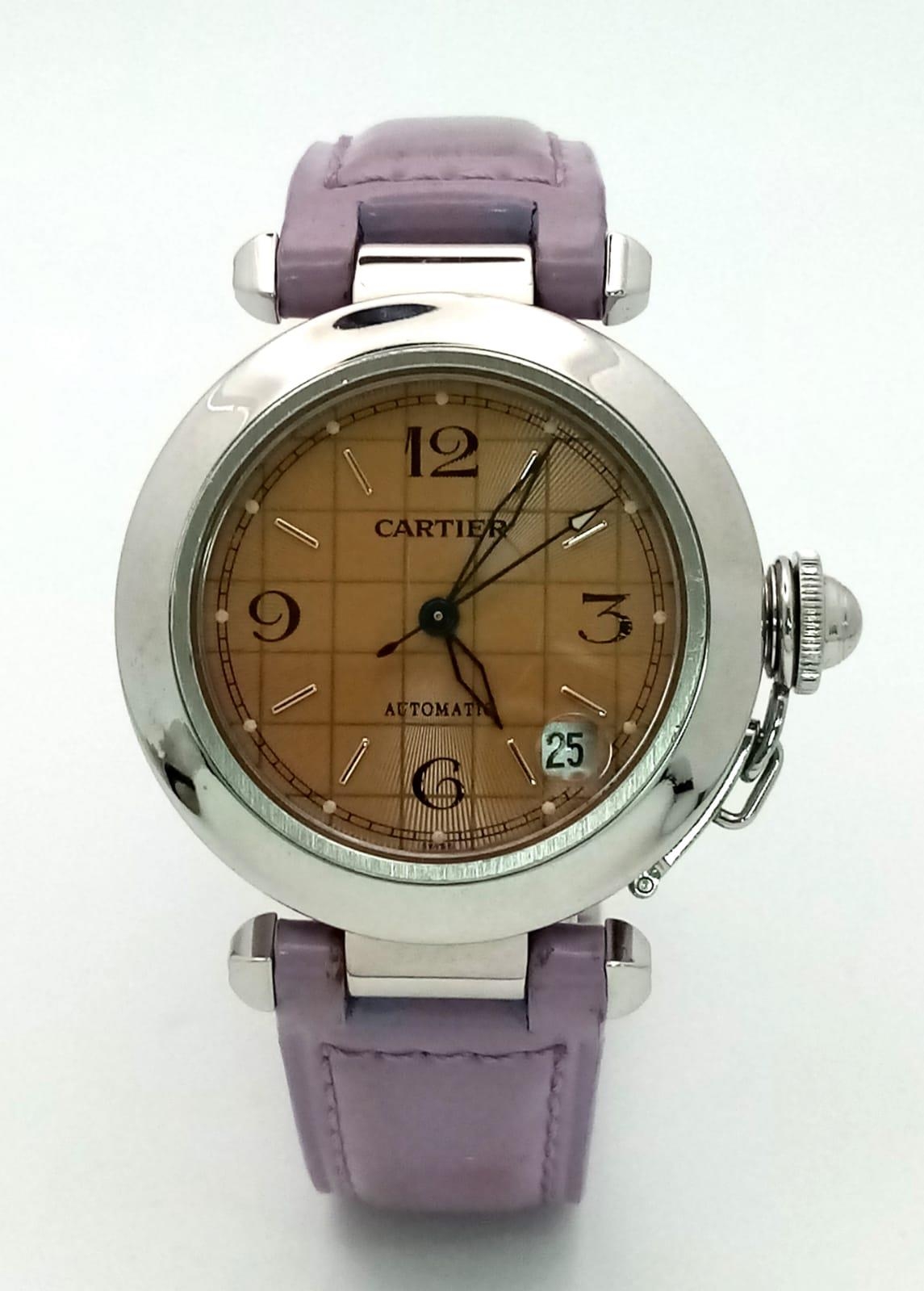 A Pasha de Cartier Automatic Ladies Watch. Lavender leather strap. Stainless steel case - 36mm.