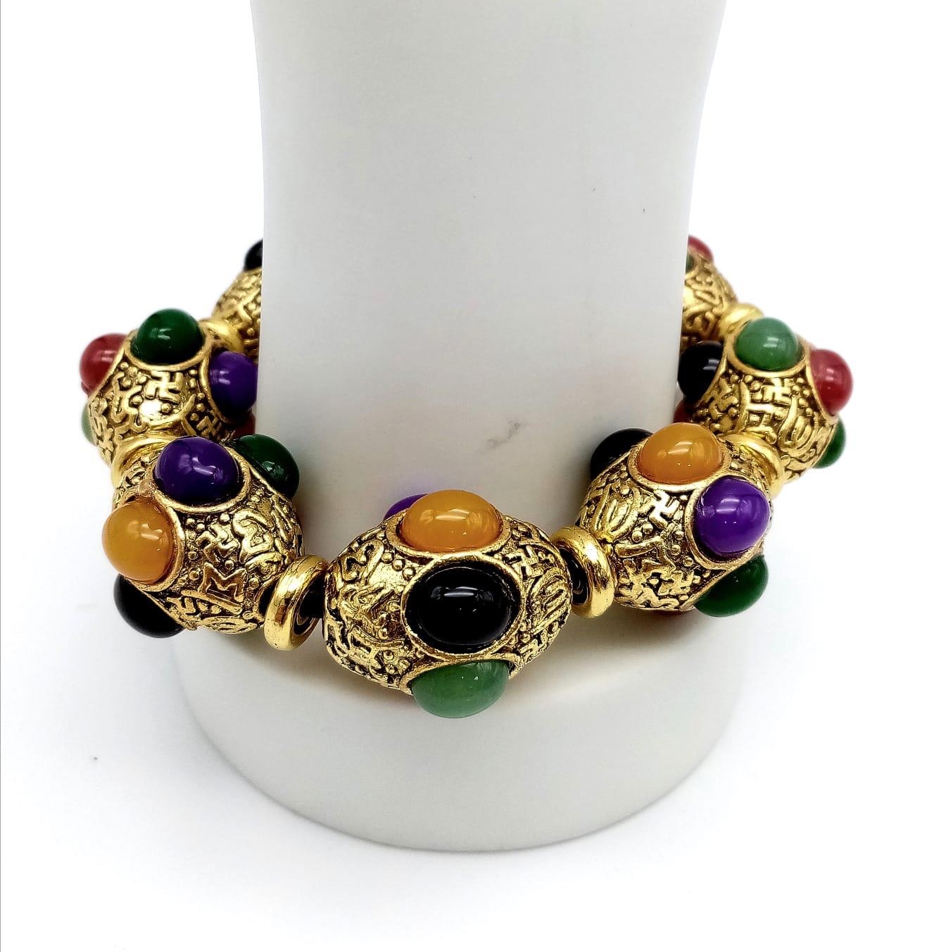 A Gilded Tibetan Style Bracelet with Multi-Colour Jade Cabochon Decoration. Gilded spacers. - Image 4 of 4