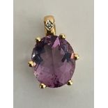 Hallmarked 9 carat YELLOW GOLD PENDANT set with a beautiful Oval Cut 3 carat AMETHYST in