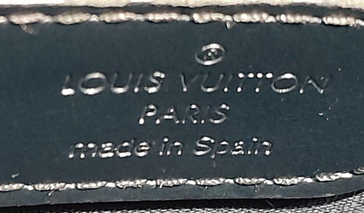 A Louis Vuitton Metallic Grey 'Stockton' Bag. Monogram leather exterior with silver-tone hardware - Image 6 of 9