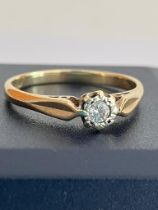 9 carat GOLD RING Having a single DIAMOND set to top. Full UK hallmark.1.49 grams. Size K 1/2.