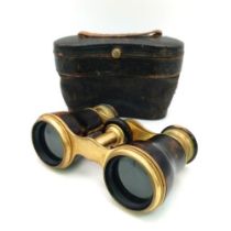An Antique Pair of Faux Tortoiseshell Opera Glasses. In very good condition and working order -