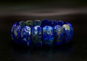A Faceted Expandable Lapis Lazuli Bracelet. Comes with case.