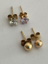 2 x pairs of 9 carat GOLD STUD EARRINGS. To include Gold Ball and Gemstone set designs. Complete