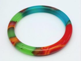 A Multi-Coloured Slimline Jade Bangle. 6cm inner diameter. 10mm width.