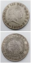 An 1818 George III Half-crown Silver Coin. Small head. S3789. Please see photos for conditions.