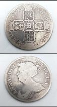 A 1709 Queen Anne Half Crown Silver Coin. Octavo. S3604. Please see photos for conditions.