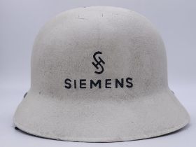 WW2 and after German Non-Conductive Helmet. Worn by “Siemens” Electrical and telephone engineers.