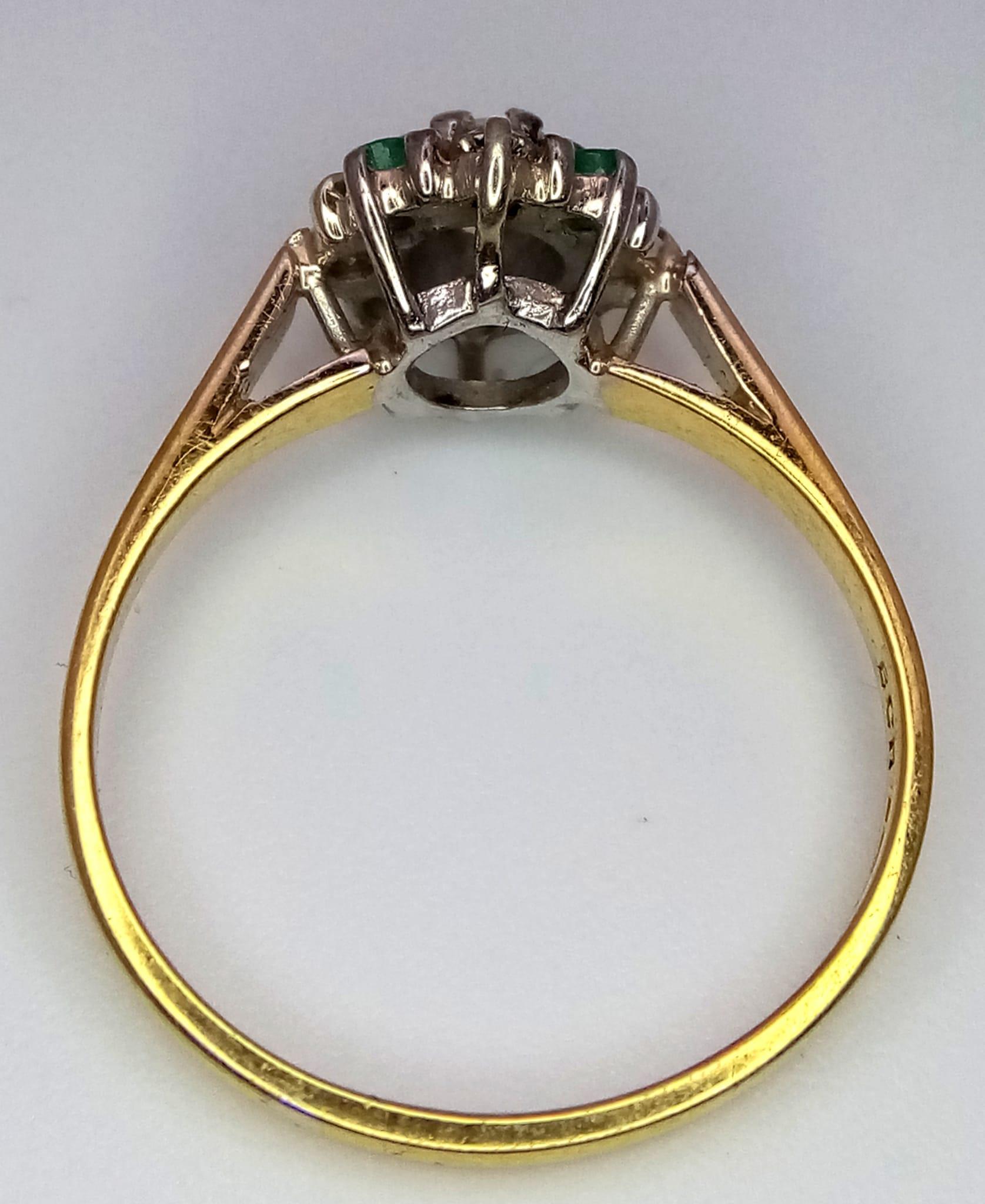 A 9k Yellow Gold Emerald and Diamond Decorative Floral Ring. Size M. 2.14g total weight. - Image 2 of 4