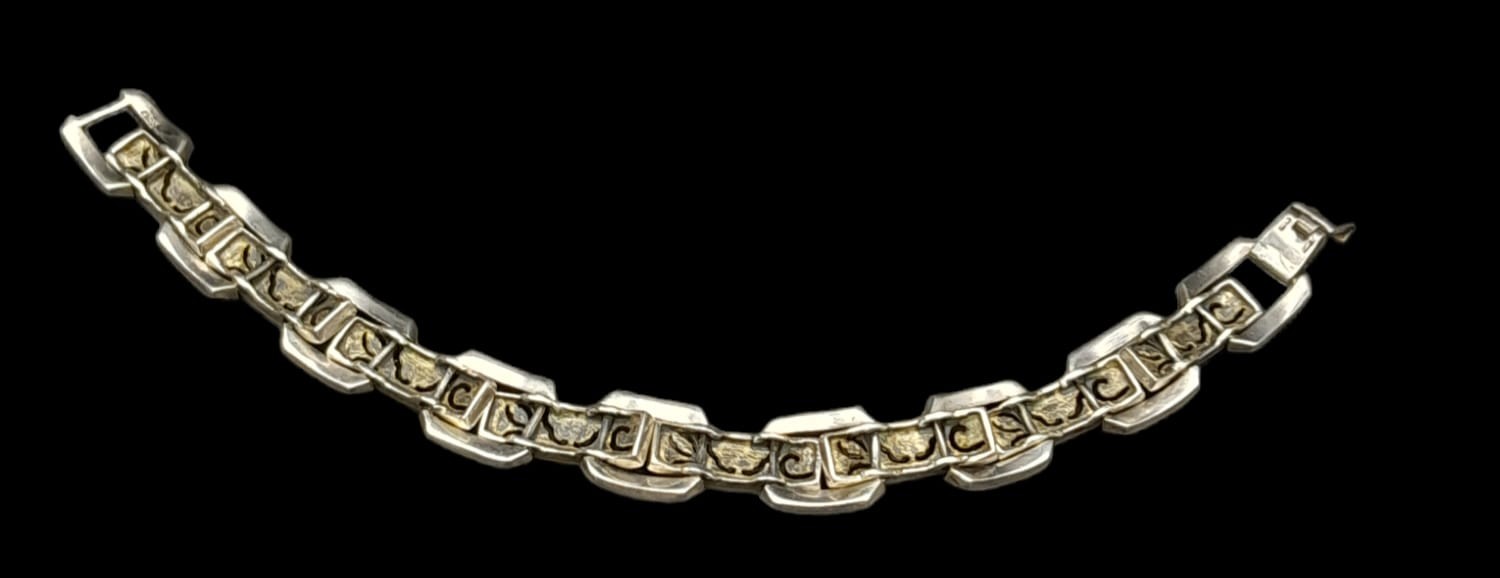 A vintage, sterling silver bracelet, with an elaborate filigree design studded with marcasite. - Image 3 of 5