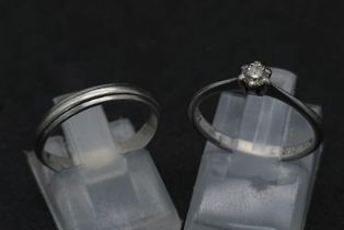 A Platinum Diamond Engagement Ring and Wedding Ring. Both size K. 5g total weight.