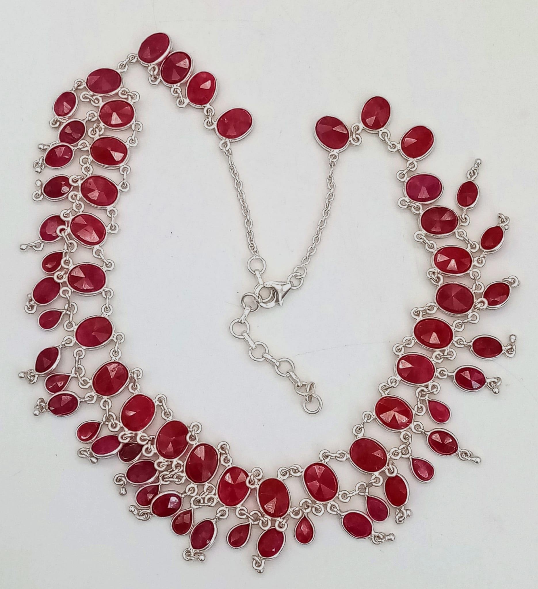 A Ruby Gemstone Choker Necklace set in 925 Silver. Two rows of oval cut rubies. 38.58g total weight. - Image 2 of 4