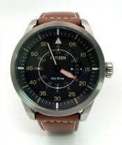 A Citizen Eco-Drive Gents Watch. Brown leather strap. Stainless steel case - 44mm. Black dial with