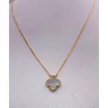 An 18K Yellow Gold and Mother of Pearl Clover Pendant on an 18K Gold Necklace. 17mm and 42cm. 4.6g