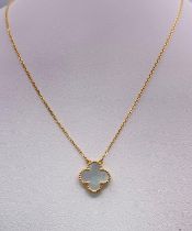 An 18K Yellow Gold and Mother of Pearl Clover Pendant on an 18K Gold Necklace. 17mm and 42cm. 4.6g