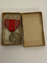 A Japanese WW2 Red Cross Medal with Ribbon. In box. ML401.