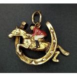 A Wonderful Vintage Horse-Shoe 9K Yellow gold Pendant - With golden thoroughbred and enamel