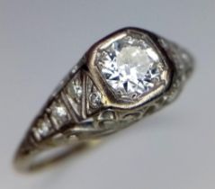 An ART DECO, 18 K white gold diamond ring by SAUNDERS. Ring size: M1/2, weight: 1.8 g.