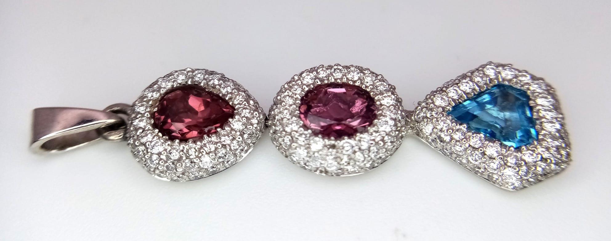 An 18K White Gold (tested) Ruby, Diamond and Topaz Drop Pendant. Three gemstones with diamond - Image 4 of 6