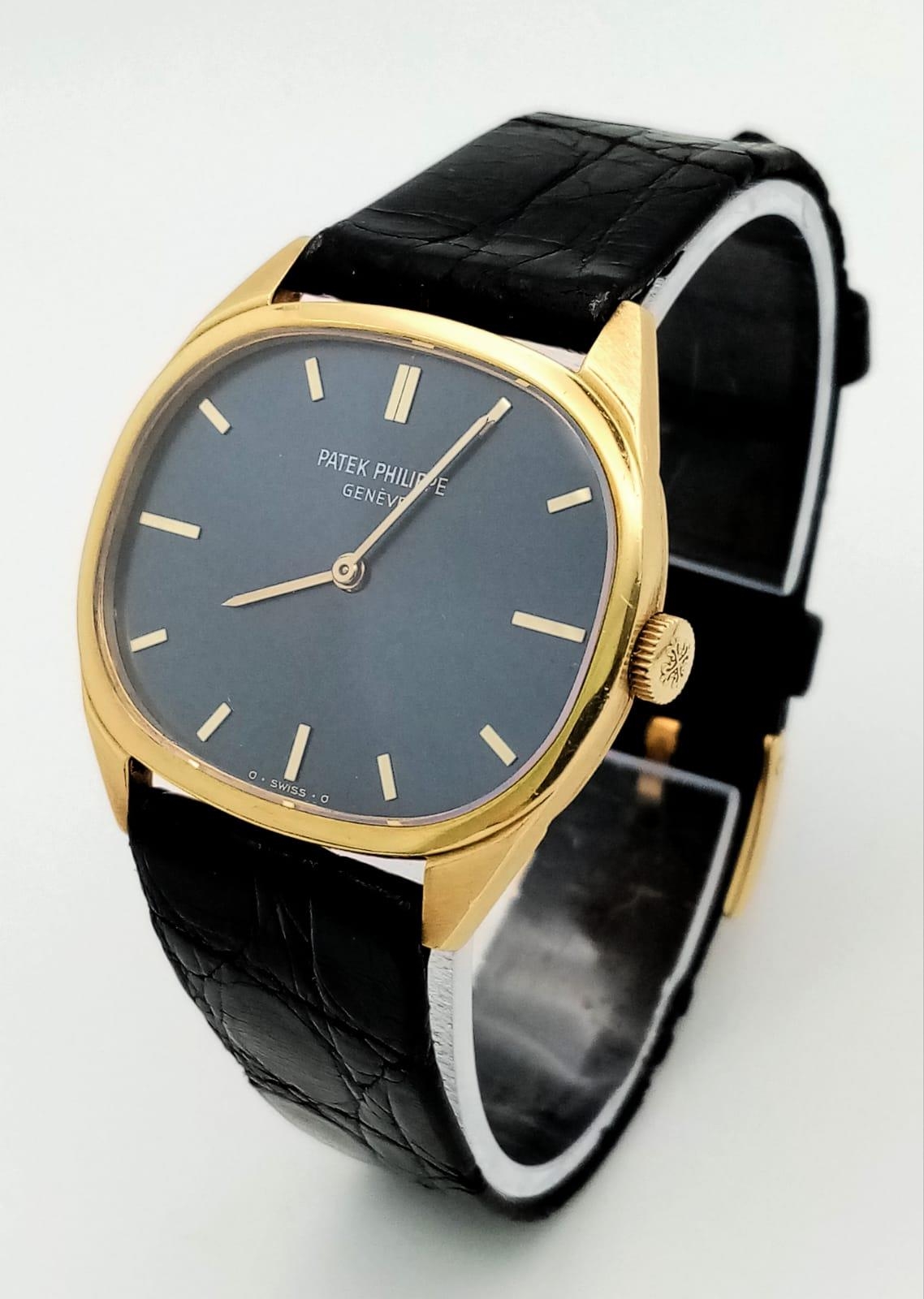 A Vintage Patek Philippe 18K Gold Watch. Black leather strap - 18k gold buckle. 18k gold case - - Image 3 of 6