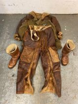 A British RAF Leather Flight Suit with Battle Dress Blouse and Boots. The boots are fur-lined and in