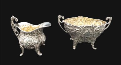 A set of Sterling Silver footed Sugar Bowl and Creamer. Extremely well looked after, both these