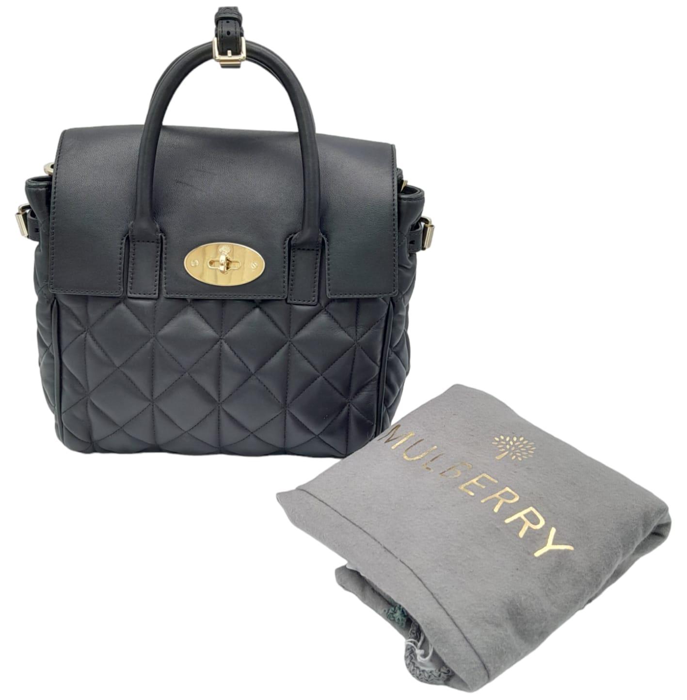 Mulberry Black Quilted Leather Cara Delevingne Convertible Bag. Versatile in design, it comes with