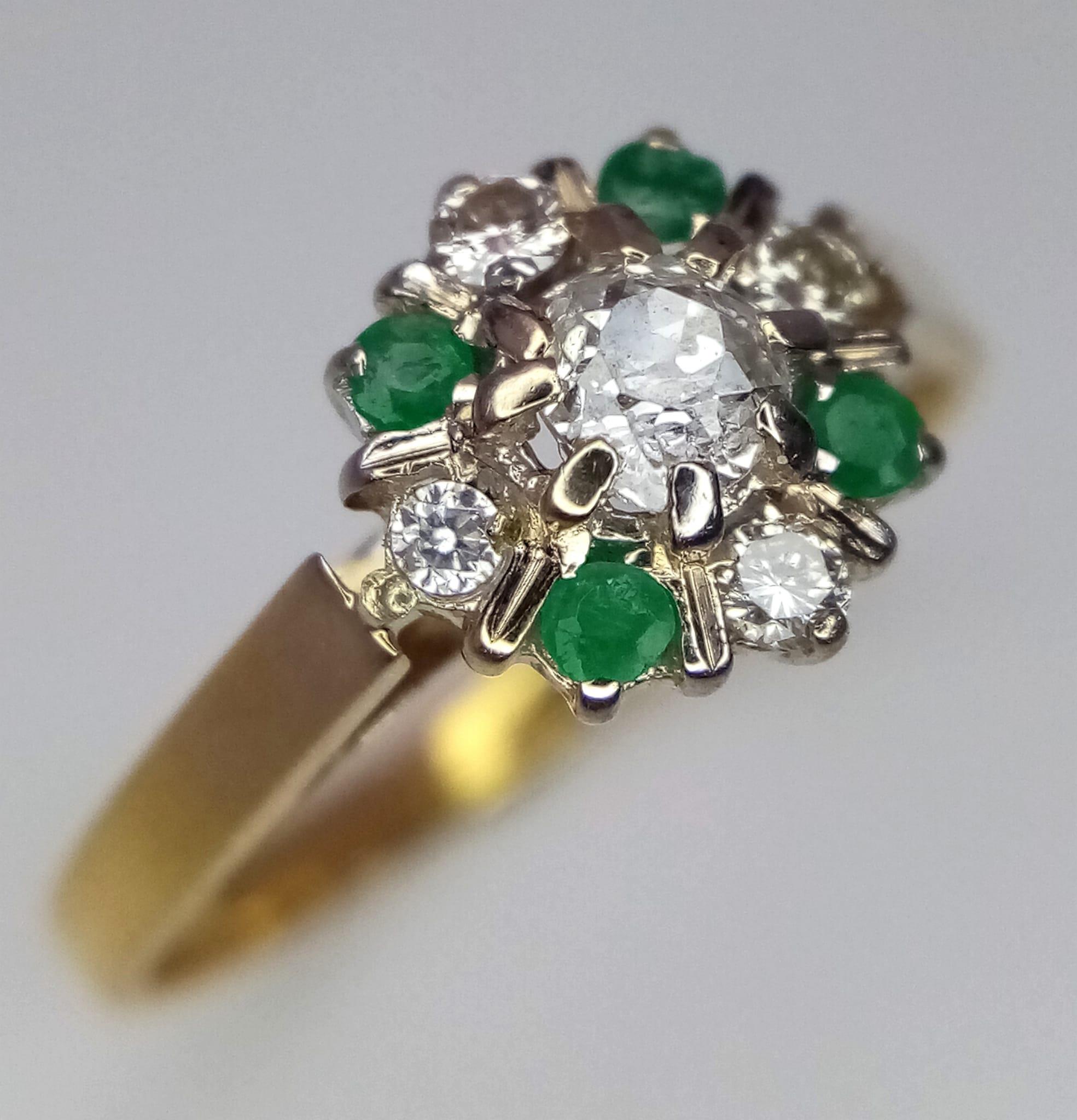A 9k Yellow Gold Emerald and Diamond Decorative Floral Ring. Size M. 2.14g total weight. - Image 3 of 4