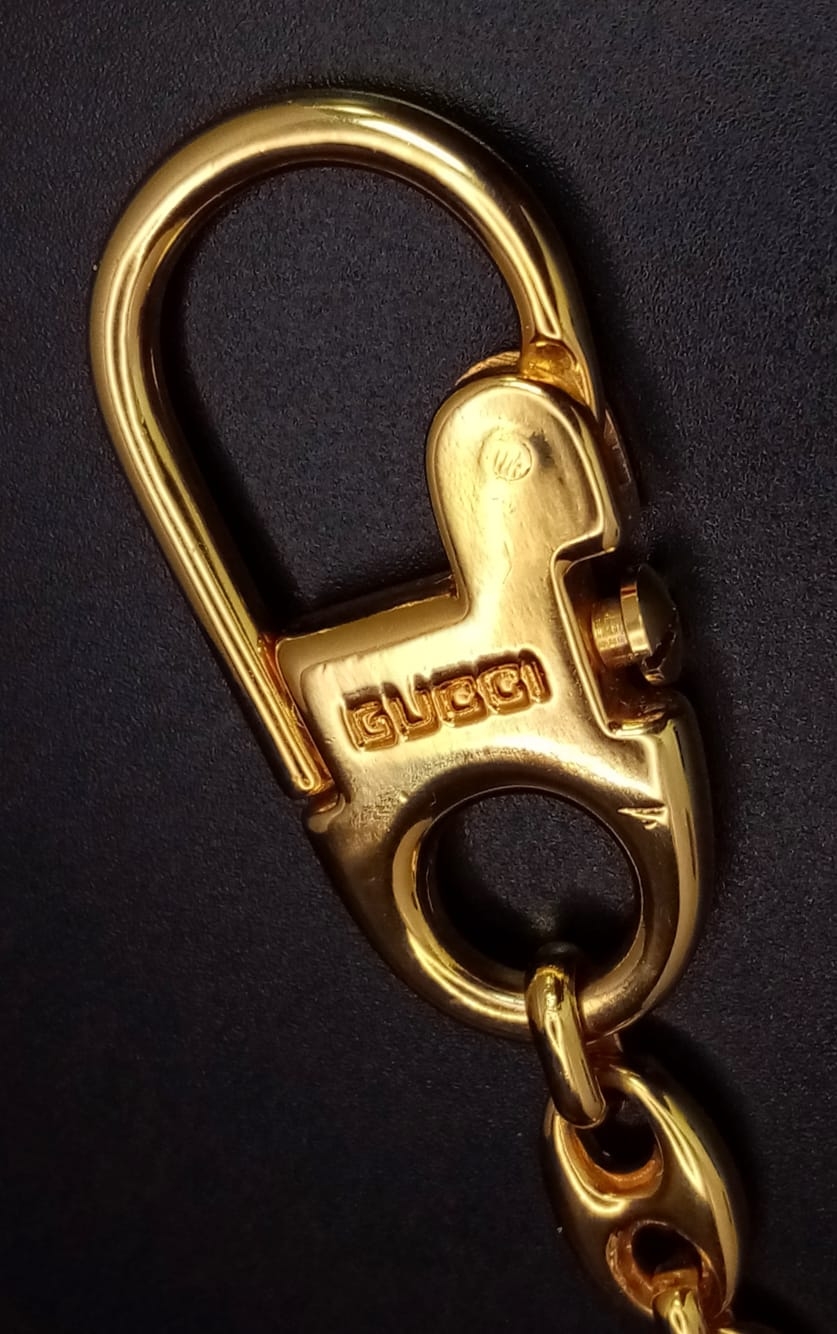 A Gucci Gold Plated Interlocking Keychain. This well constructed Gucci logo keychain is 12cm in - Image 3 of 4