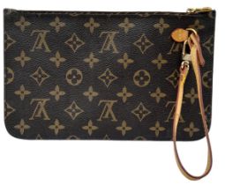 Quality Louis Vuitton Pouch in classic monogram design. Features gold tone hardware, striped