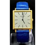 A Vintage Retro 18k Gold Patek Philippe Geneve Ladies Watch. Electric blue leather strap with 18k