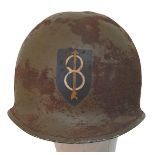 WW2 US Front Seam Swivel Bale M-1 Helmet with insignia of the 8th Infantry Division.