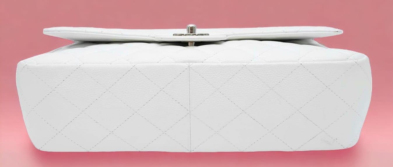 An exquisite Chanel White Caviar Classic Flap Bag. The interior is lined in a tonal leather, care - Image 3 of 11