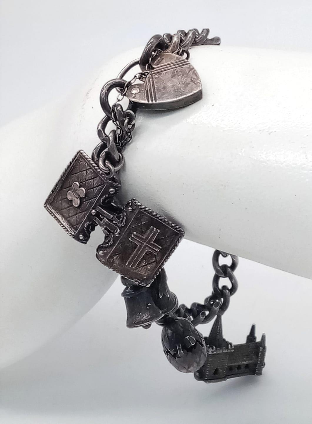 A Vintage 925 Silver Charm Bracelet with Heart Clasp. 44.53g total weight. - Image 5 of 5