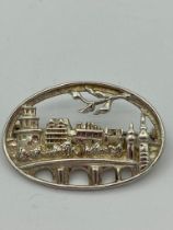 Bridge scene SILVER BROOCH with marking for the MOSER and PFEIL STUDIO. 3.3 cm x 2.2 cm.