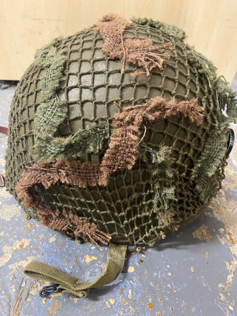 A Late WW2 USA M1c Paratrooper Rear Seam Helmet. Appears to have the number 1160 on the front. The - Image 2 of 11