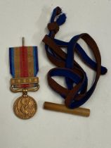 A WW2 Japanese Incident Medal with a Japanese Sword Knot. ML400.